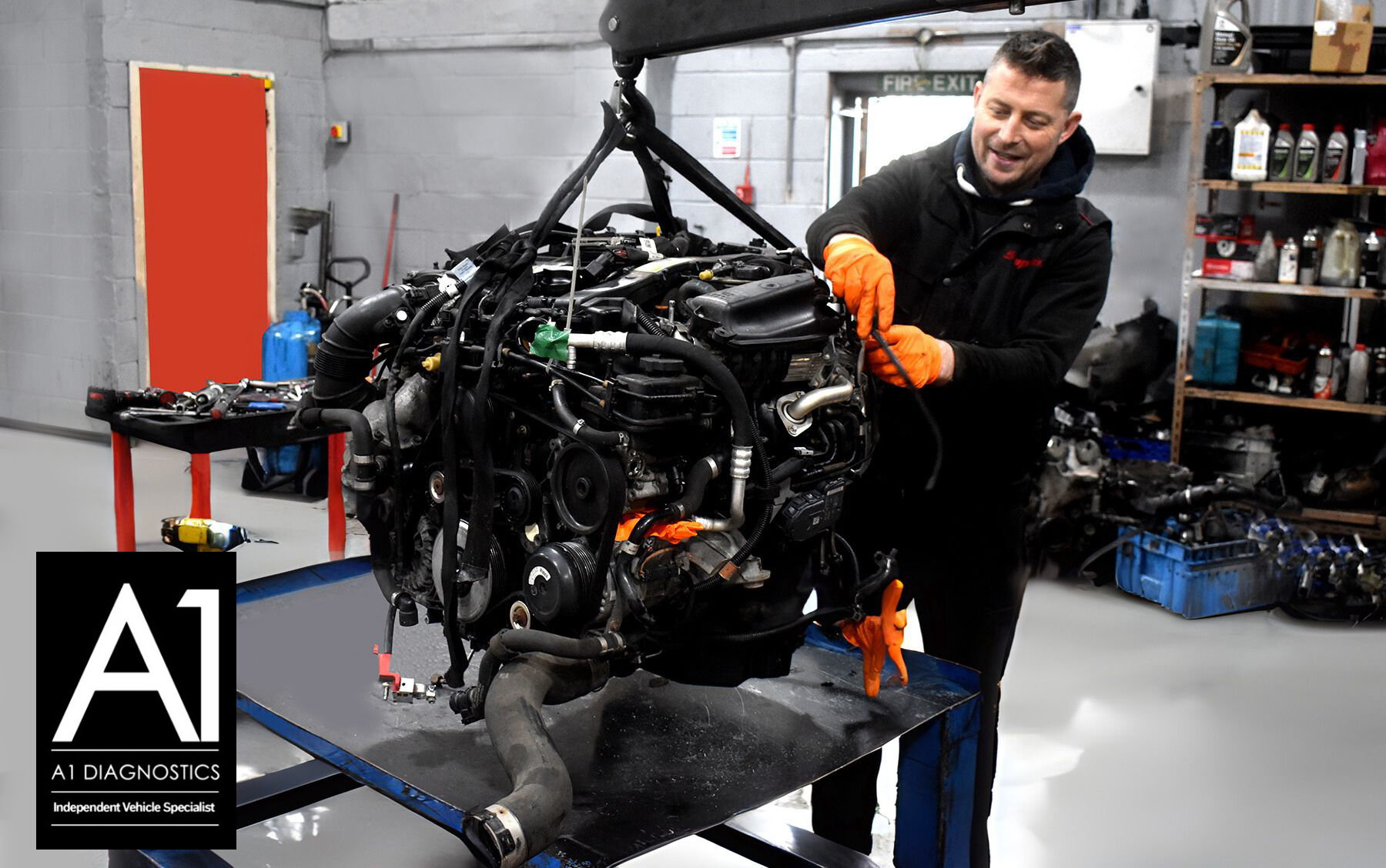 Our engine mechanics checking over a recently fitted BMW engine